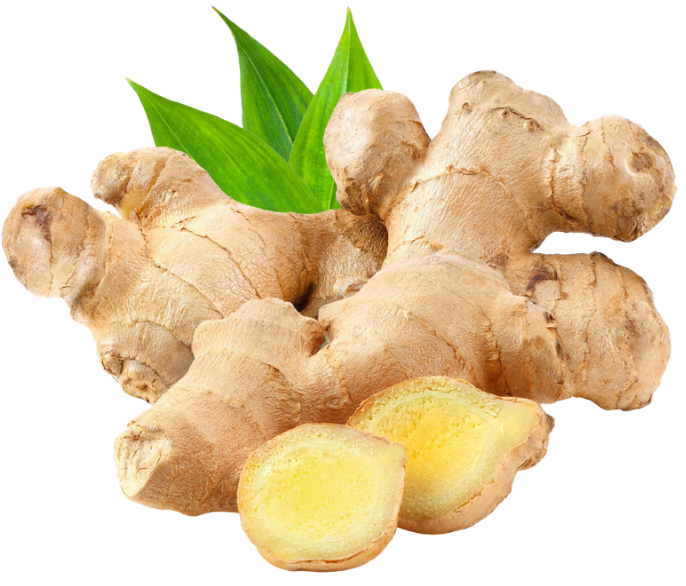 Whole fresh ginger roots and sliced pieces revealing the yellow interior, used as a key skincare ingredient