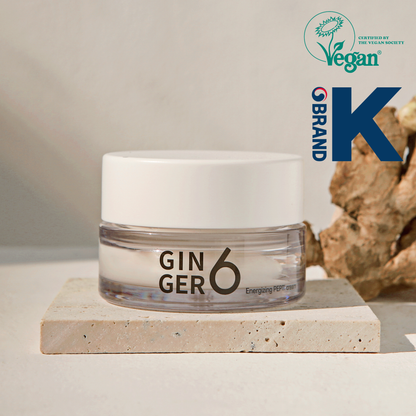 Ginger6 Energizing PEPTI Night Cream 50ml jar with raw ginger root, featuring Vegan Society and Brand K logos